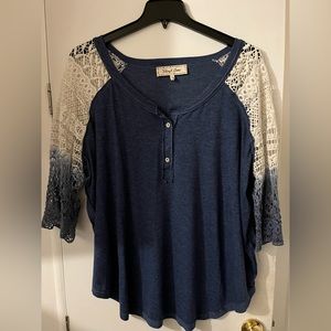 Sheryl Crow Henley shirt with crocheted sleeves in cream and blue hombre.